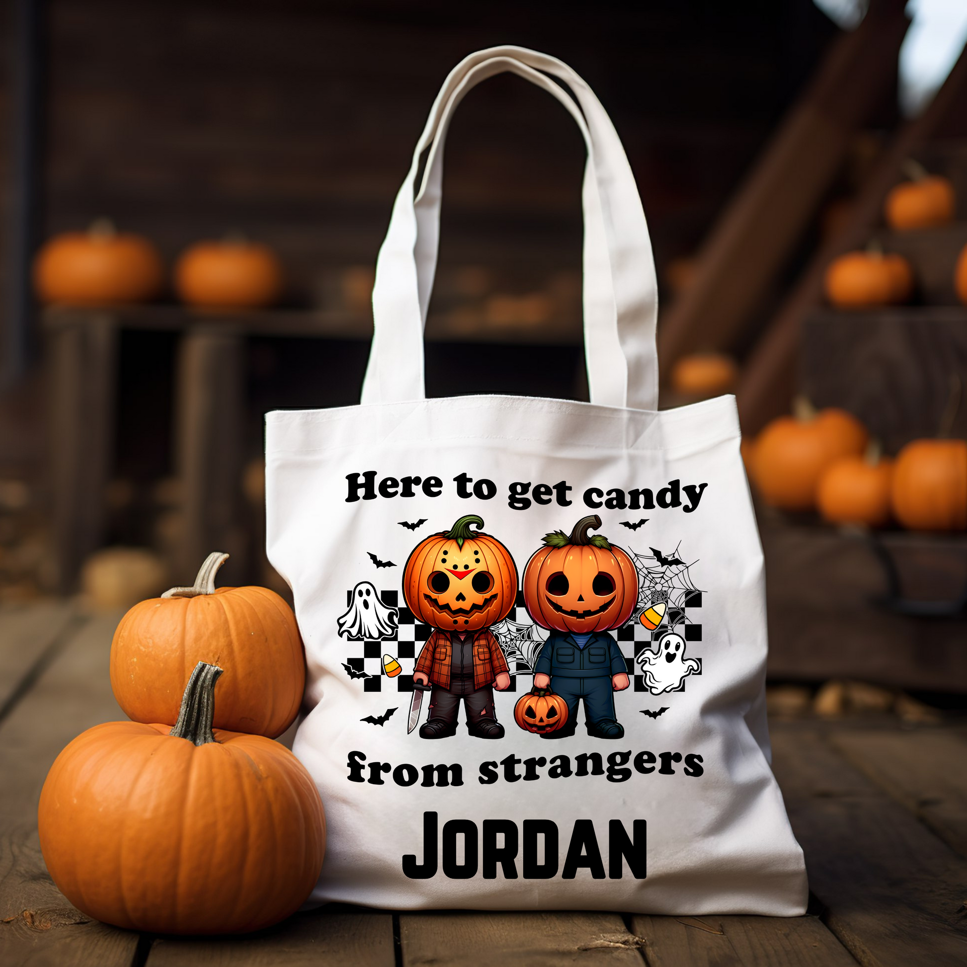 Personalized "Here to Get Candy from Strangers" Halloween tote bag featuring a fun slogan, perfect for trick-or-treating and collecting candy, with customizable name option.