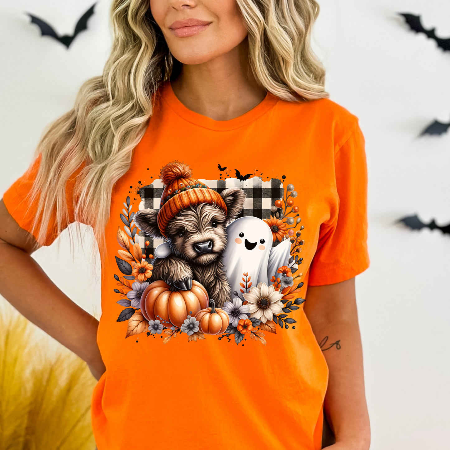 Halloween Buffalo Plaid Highland Cow & Ghost T-Shirt in a farmhouse style with a buffalo plaid headband and a smiling ghost, ideal for fall and Halloween celebrations.