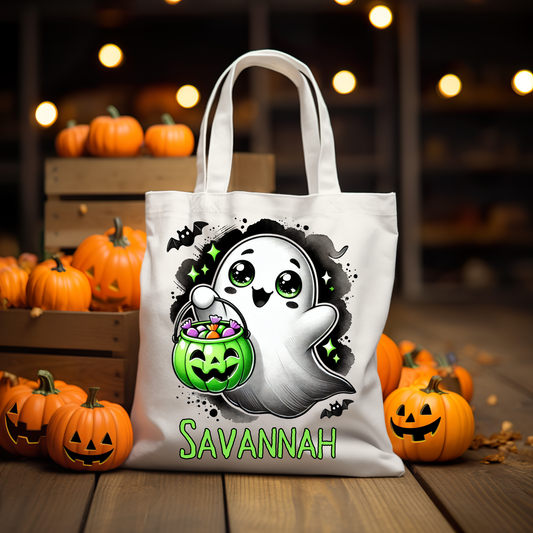 Personalized cute ghost holding a trick-or-treat pumpkin bucket tote bag, perfect for Halloween, with customizable name option for kids.