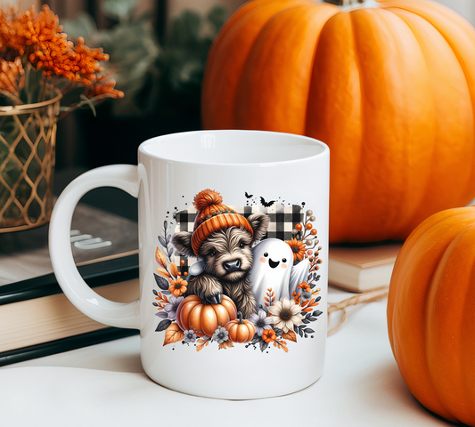 Highland cow and ghost Halloween fall white coffee mug, 15oz ceramic mug featuring a cute cow in a ghost costume. Perfect for fall and spooky season lovers.