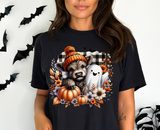 Halloween Buffalo Plaid Highland Cow & Ghost T-Shirt in a farmhouse style with a buffalo plaid headband and a smiling ghost, ideal for fall and Halloween celebrations.