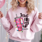Light pink sweatshirt featuring a tumbler wrapped in Christmas lights with the text “Jesus Fills My Cup” and Psalm 23:5