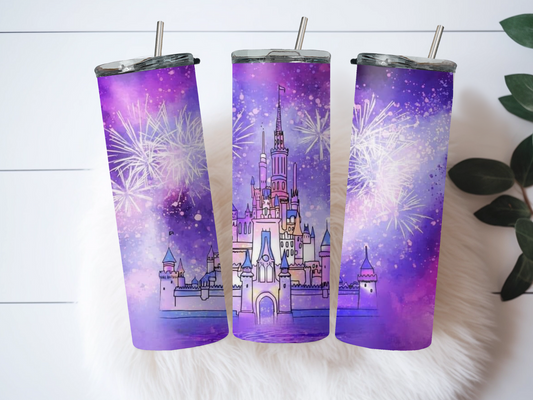 20oz Skinny Tumbler featuring a magical castle illustration with vibrant fireworks in a dreamy purple sky. Stainless steel tumbler with double-wall vacuum insulation, perfect for keeping drinks hot or cold. Includes spill-resistant lid and reusable straw. Ideal for Disney lovers, fantasy fans, and adding enchantment to your daily routine.