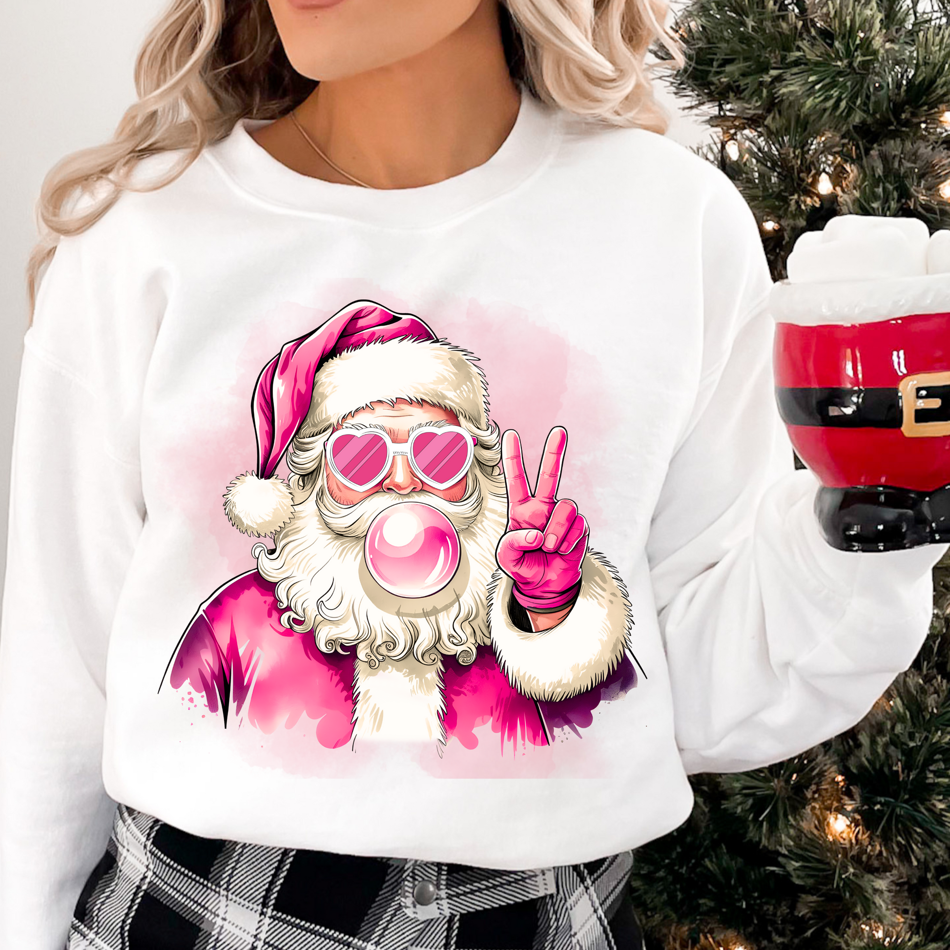 Sweatshirt with pink Santa design featuring Santa blowing bubblegum, wearing heart-shaped sunglasses, and holding a peace sign